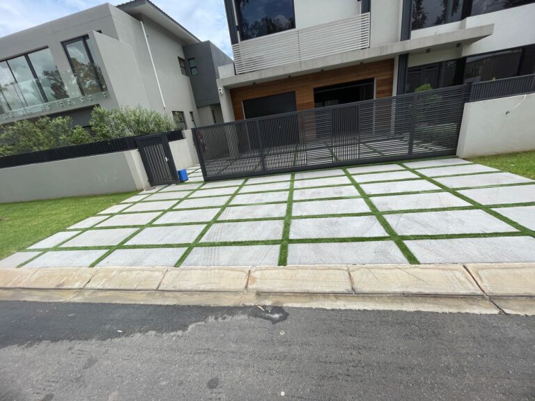 Light grey stepping stones for driveway